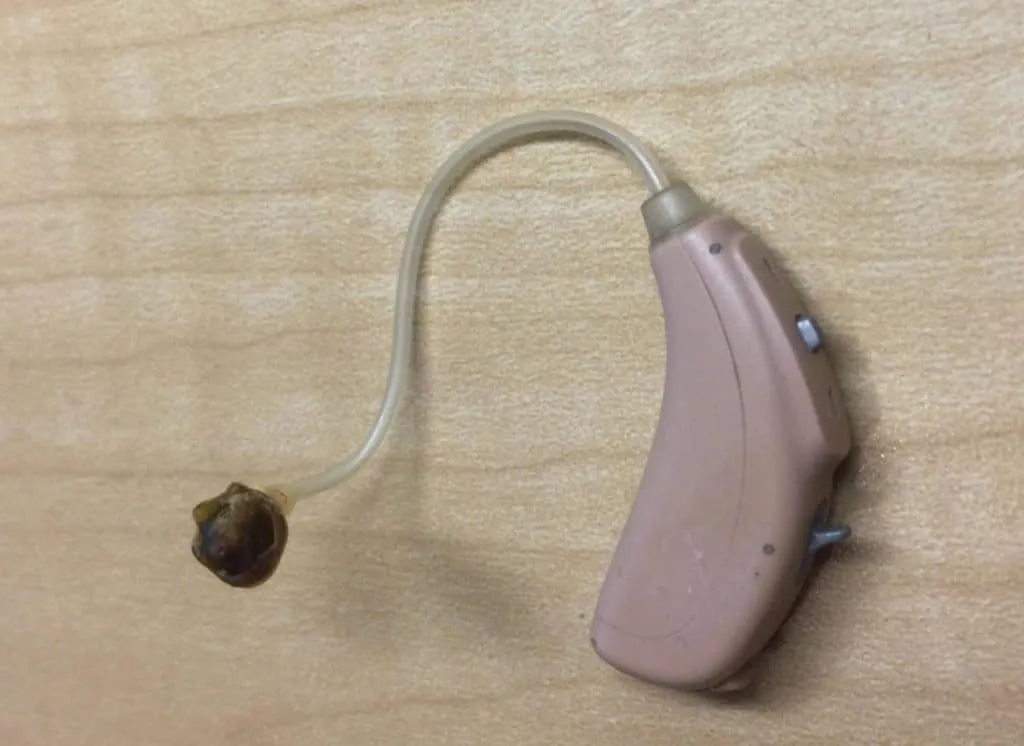 hearing aid needing repair older than 2 years old