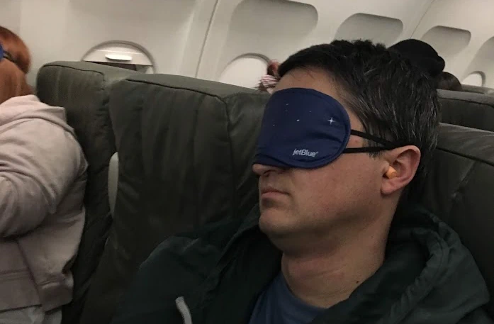 wearing earplugs on airplane flight