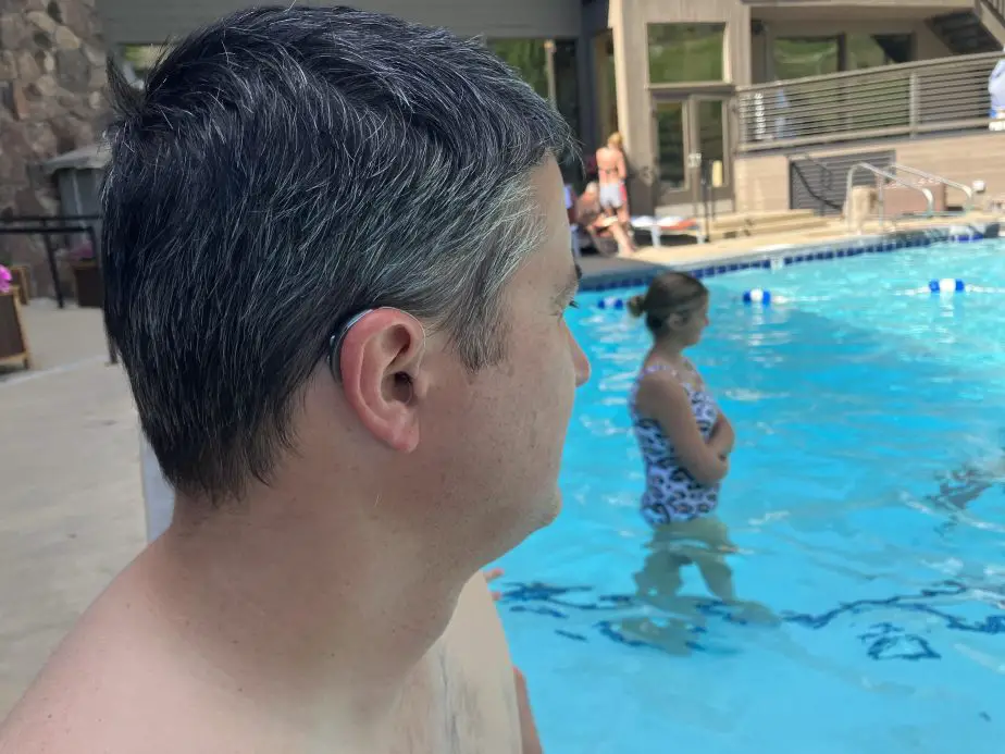 Wear hearing aids at pool. needs to be waterproof.